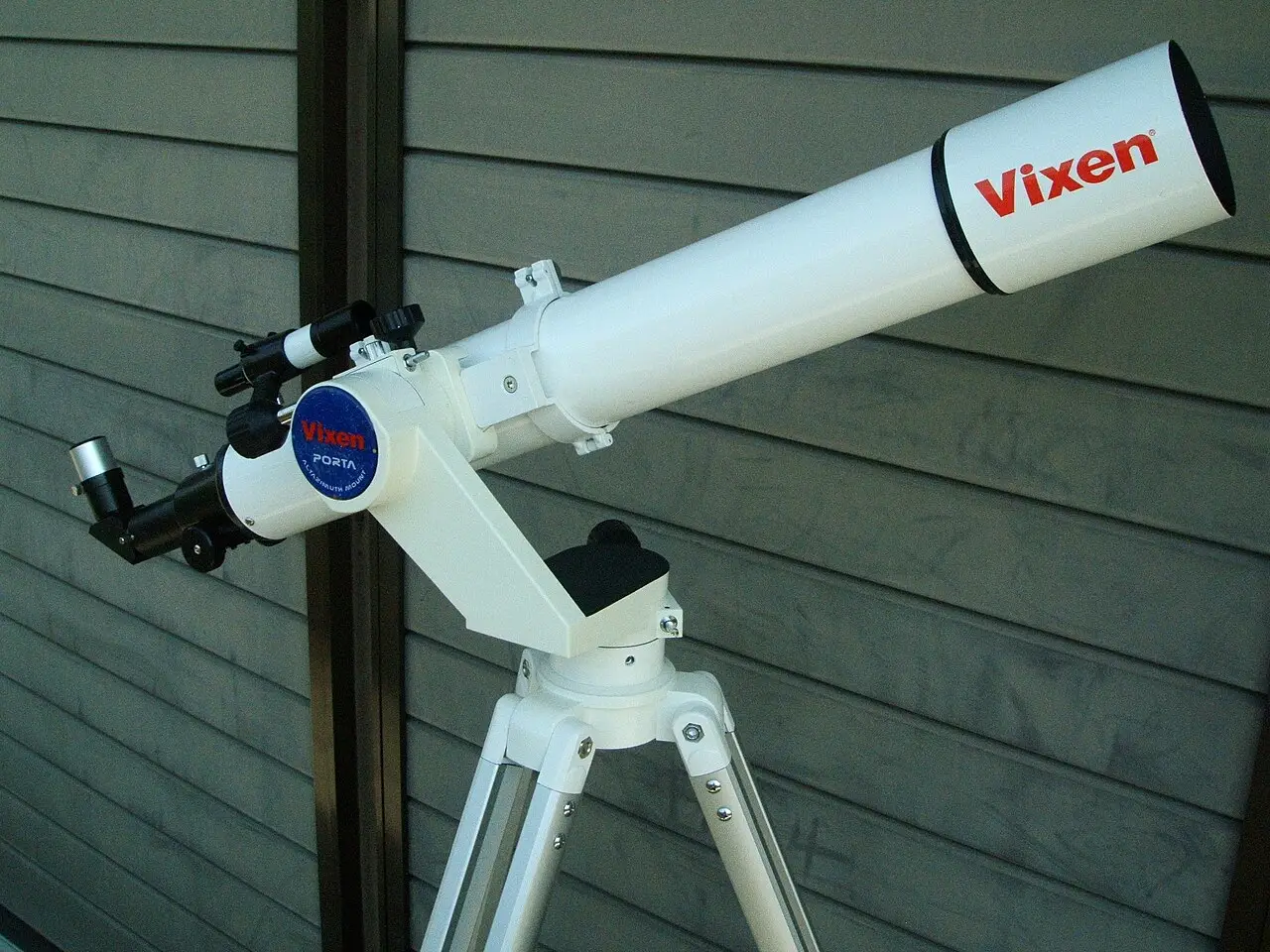 Photograph: refracting telescope on its mount